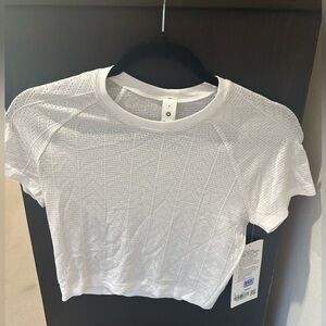 Lululemon Swiftly Pointelle Cropped Short Sleeve Top
White Size 6
